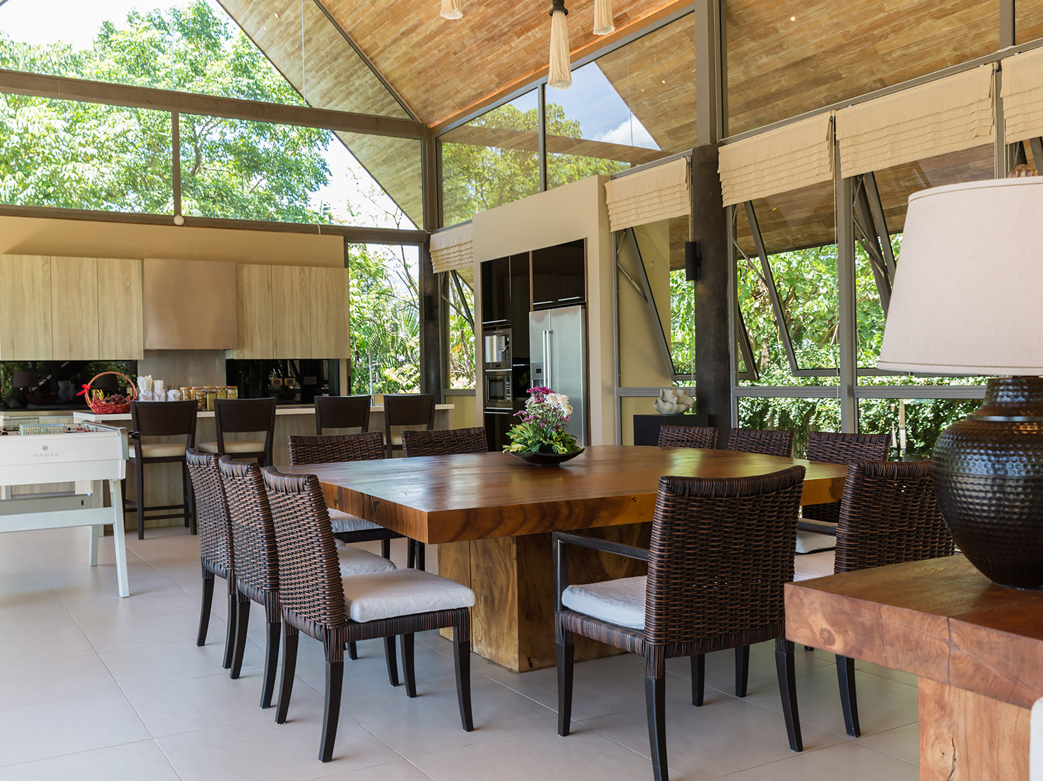 Expansive Dining Table and Social Entertainment Deck for Group Villa Rentals